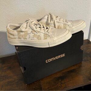 Converse leather sneakers with metallic gold accents